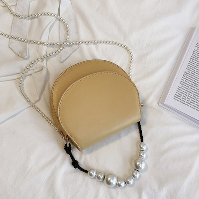 Stílusos női táska eko bőrből négy színben, rövid és hosszú gyöngy fogantyúval két modell