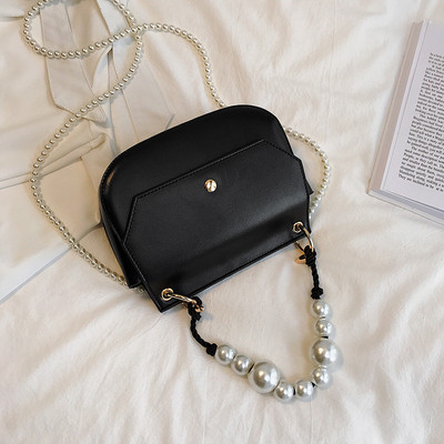 Stílusos női táska eko bőrből négy színben, rövid és hosszú gyöngy fogantyúval két modell