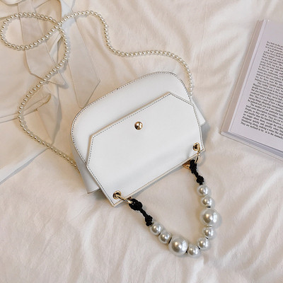 Stílusos női táska eko bőrből négy színben, rövid és hosszú gyöngy fogantyúval két modell