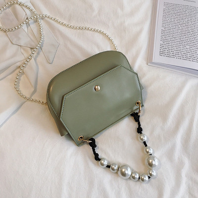 Stílusos női táska eko bőrből négy színben, rövid és hosszú gyöngy fogantyúval két modell