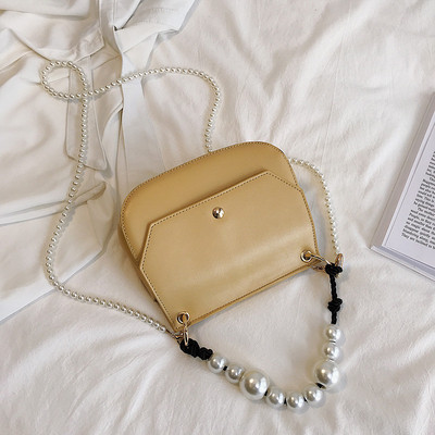 Stílusos női táska eko bőrből négy színben, rövid és hosszú gyöngy fogantyúval két modell