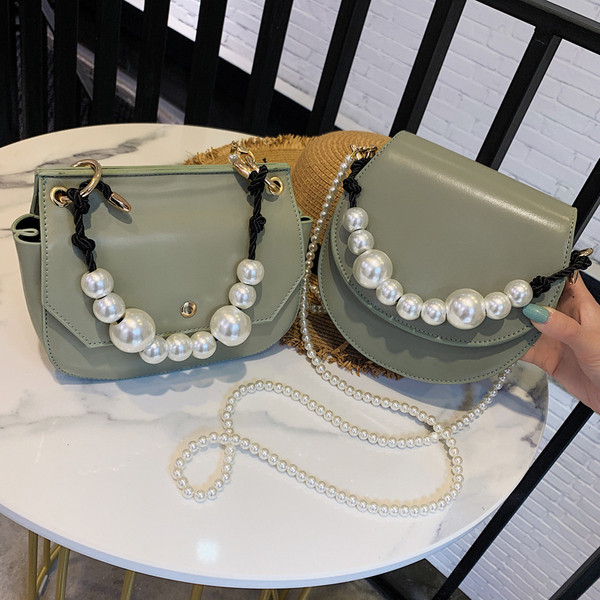 Stílusos női táska eko bőrből négy színben, rövid és hosszú gyöngy fogantyúval két modell