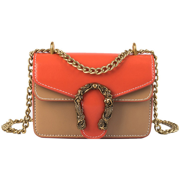 Geanta de dama eleganta in patru culori din piele ecologica cu decor metalic 3D si lant metalic lung