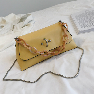 Öko bőrből készült modern női táska négy színben fém díszítéssel, rövid és hosszú füllel