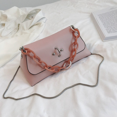 Öko bőrből készült modern női táska négy színben fém díszítéssel, rövid és hosszú füllel