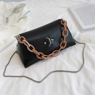 Öko bőrből készült modern női táska négy színben fém díszítéssel, rövid és hosszú füllel