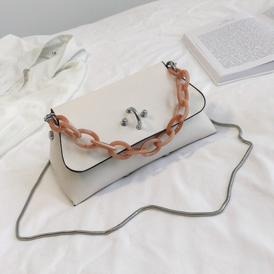 Öko bőrből készült modern női táska négy színben fém díszítéssel, rövid és hosszú füllel