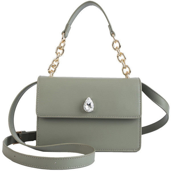 Stílusos női táska négy színű öko bőrből, díszítéssel, rövid és hosszú füllel