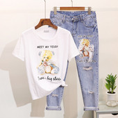 Női szett pólóval és farmerrel, rátéttel és szakadt motívumokkal