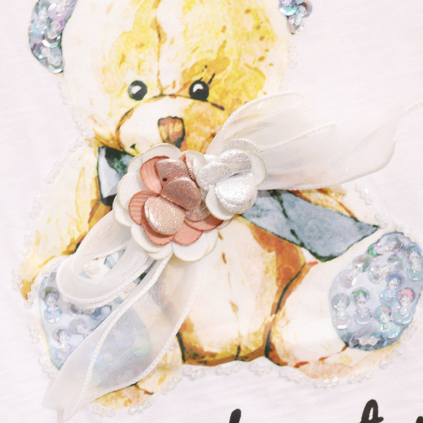 Női szett pólóval és farmerrel, rátéttel és szakadt motívumokkal