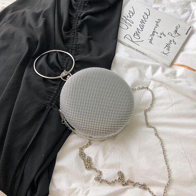 Κομψή γυναικεία τσάντα με στρογγυλό σχήμα σε τρία χρώματα με μικρή και μακρά λαβή