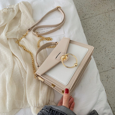 Κομψή γυναικεία έκο δερμάτινη τσάντα σε τρία χρώματα με 3D μεταλλική διακόσμηση και μακρύ και κοντή λαβή