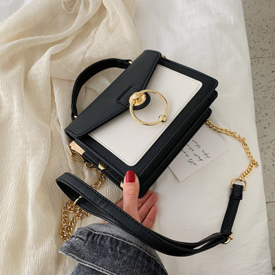 Κομψή γυναικεία έκο δερμάτινη τσάντα σε τρία χρώματα με 3D μεταλλική διακόσμηση και μακρύ και κοντή λαβή