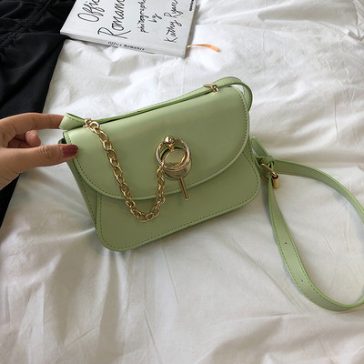 Geanta de dama moderna din piele ecologica in patru culori cu elemente metalice 3D si maner lung