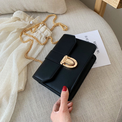 Μοντέρναγυναικεία έκο  δερμάτινη τσάντα σε πέντε χρώματα με μεταλλικό κούμπωμα και μακρά αλυσίδα