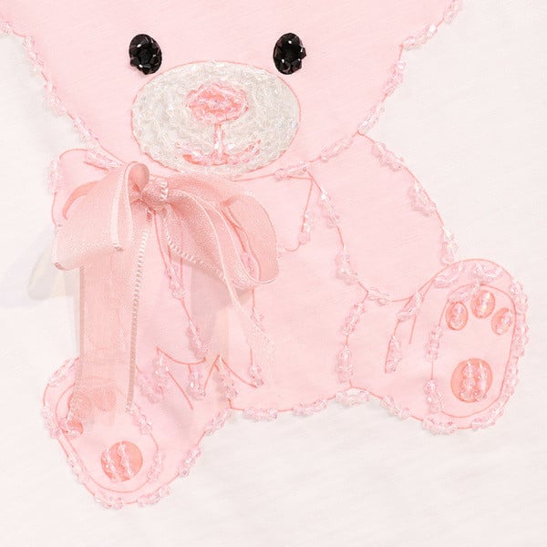 Rövid ujjú, rátéttel ellátott női póló gyöngydíszítéssel