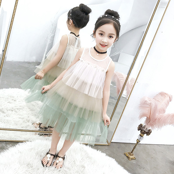 Stílusos gyerekruha két színben O-nyakú és tüllel