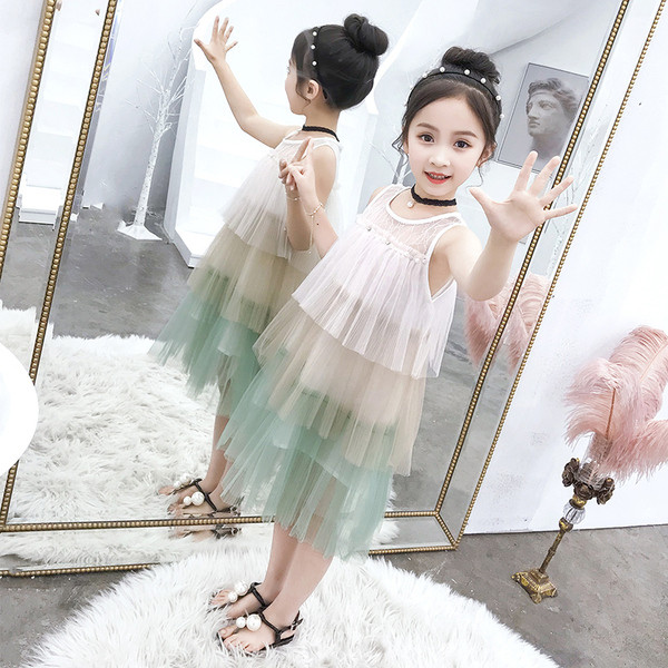 Stílusos gyerekruha két színben O-nyakú és tüllel