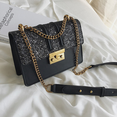 Μοντέρνα γυναικεία  τσάντα  από οικολογικό δέρμα με λαμπερά στοιχεία και μεταλλική στερέωση