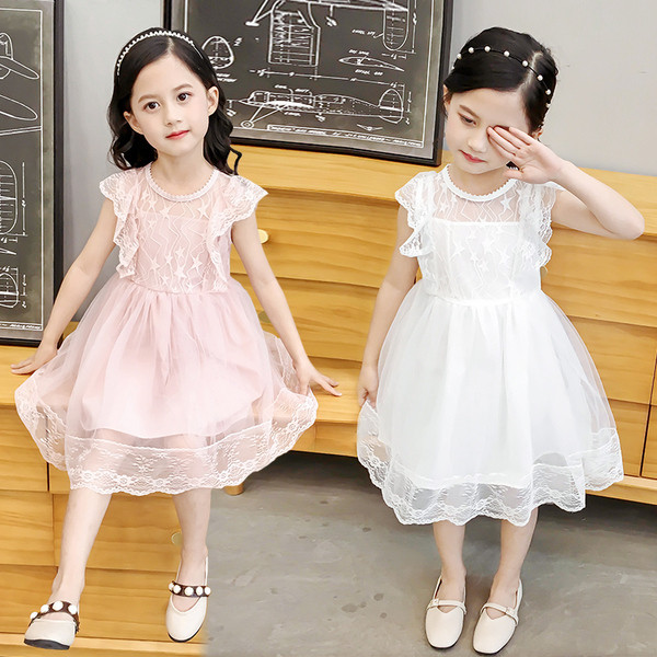 Stílusos gyerekruha fehér és rózsaszín csipkével