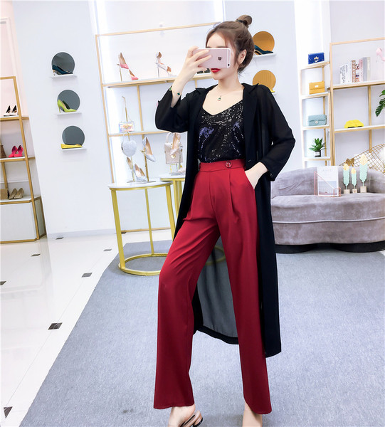 Stílusos női szett magas derekú nadrágból és felsőből vékony pántokkal, két színben