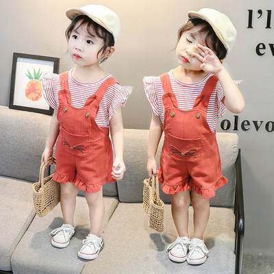 Modern, kétrészes overallból és blúzból álló gyerekszett lányoknak