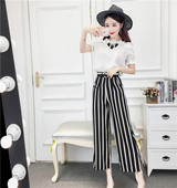 Stílusos női blúz szett 3D elemekkel és magas derekú nadrággal