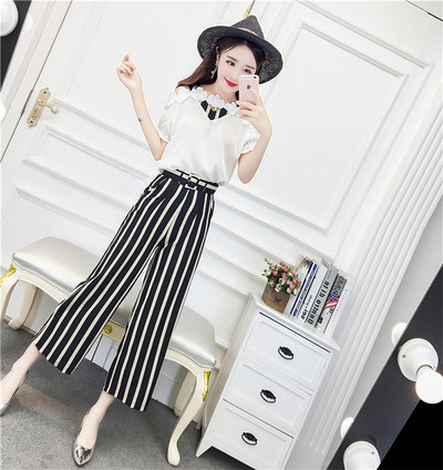 Stílusos női blúz szett 3D elemekkel és magas derekú nadrággal