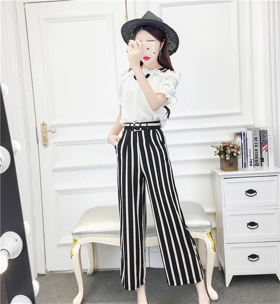 Stílusos női blúz szett 3D elemekkel és magas derekú nadrággal