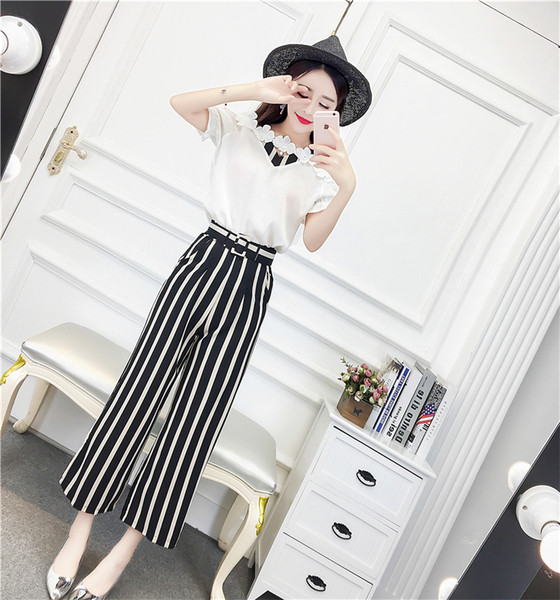 Stílusos női blúz szett 3D elemekkel és magas derekú nadrággal