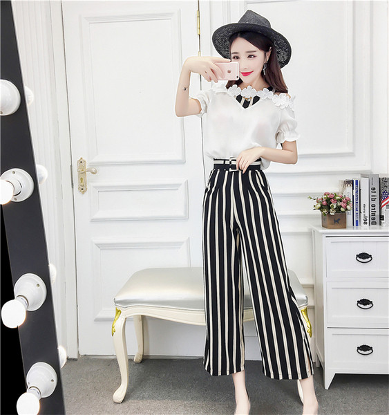 Stílusos női blúz szett 3D elemekkel és magas derekú nadrággal