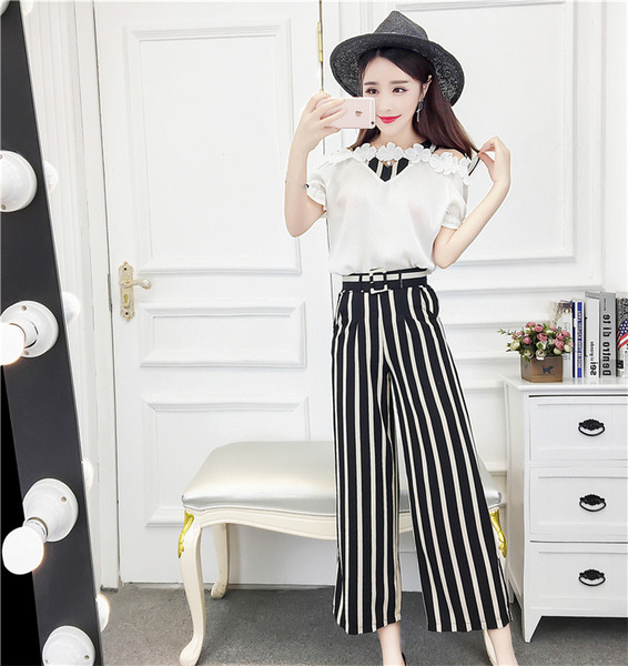 Stílusos női blúz szett 3D elemekkel és magas derekú nadrággal