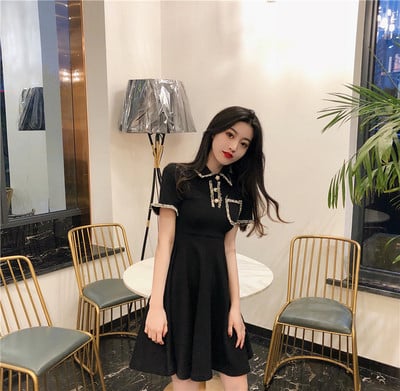 Modern női ruha modell fekete színben