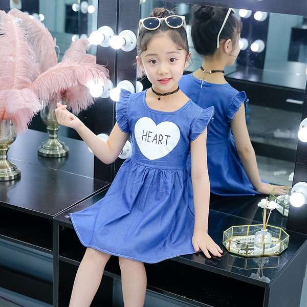 Kék színű modern gyerekruha, rátéttel