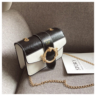 Κομψή γυναικεία τσάντα σε δύο χρώματα