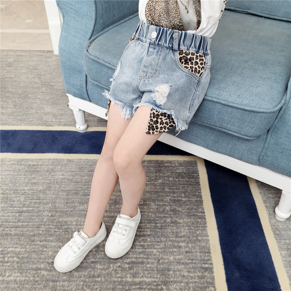 Gyerek modern rövid farmer szakadt motívumokkal - lányoknak