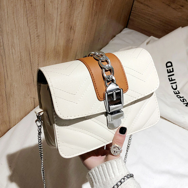 Modern női táska csattal és három színben