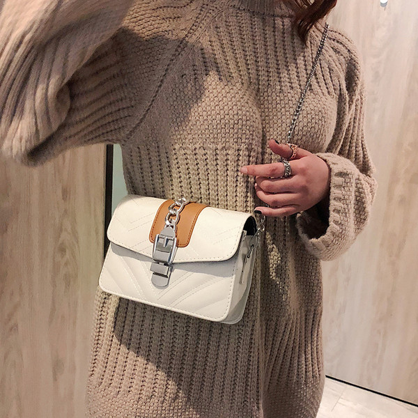 Modern női táska csattal és három színben