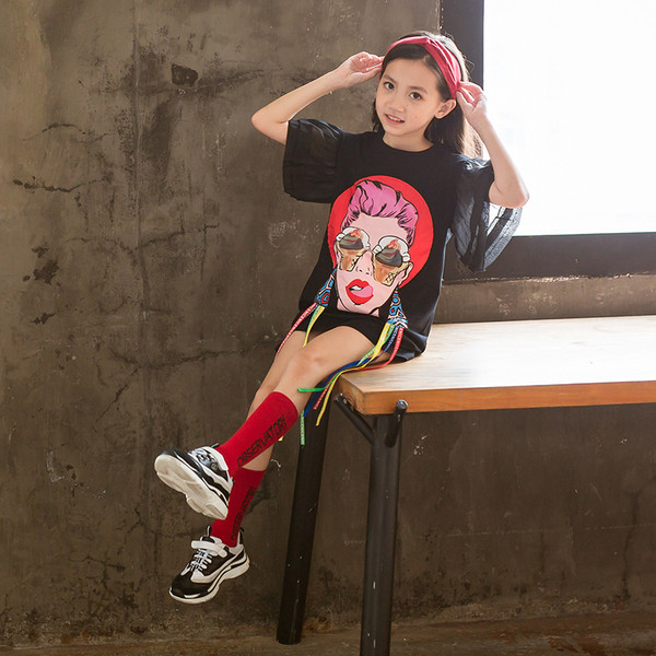 Modern gyerektunika fehér és fekete színben, rátéttel