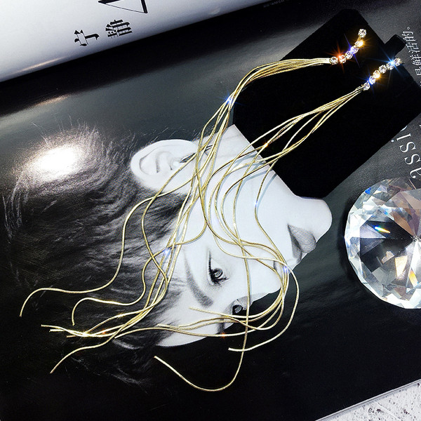 Női fülbevaló két színben díszítő kövekkel