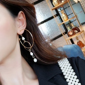 Γυναικεία μακρύ σκουλαρίκια με διακοσμητικά μαργαριτάρια