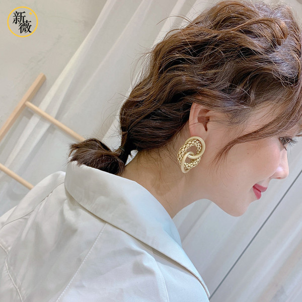 Stílusos női fülbevaló ezüst és arany színben