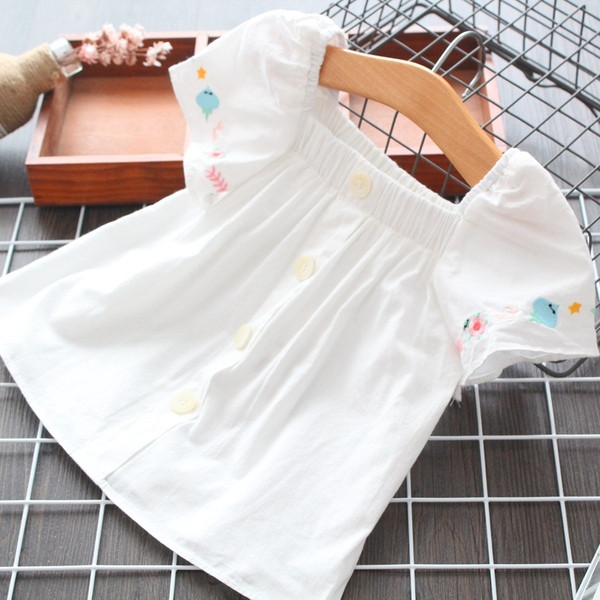 Modern, fehér gombos gyereking lányoknak