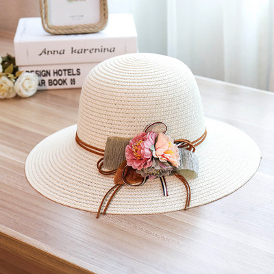 Női strandkalap virág díszítéssel
