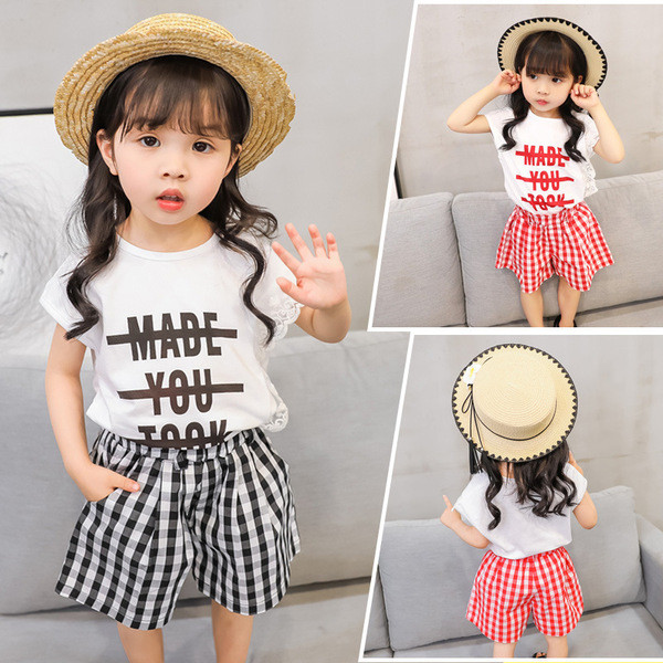 Kétrészes blúzból és nadrágból álló gyerekkészlet lányoknak