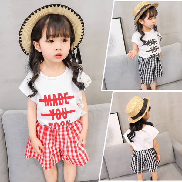 Kétrészes blúzból és nadrágból álló gyerekkészlet lányoknak