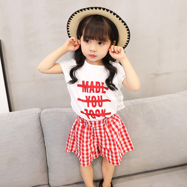 Kétrészes blúzból és nadrágból álló gyerekkészlet lányoknak