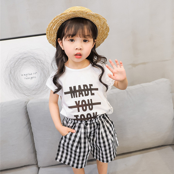 Kétrészes blúzból és nadrágból álló gyerekkészlet lányoknak