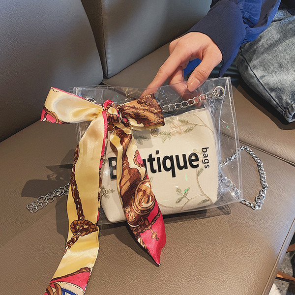 Geanta de dama moderna cu husa transparenta si broderie in patru culori