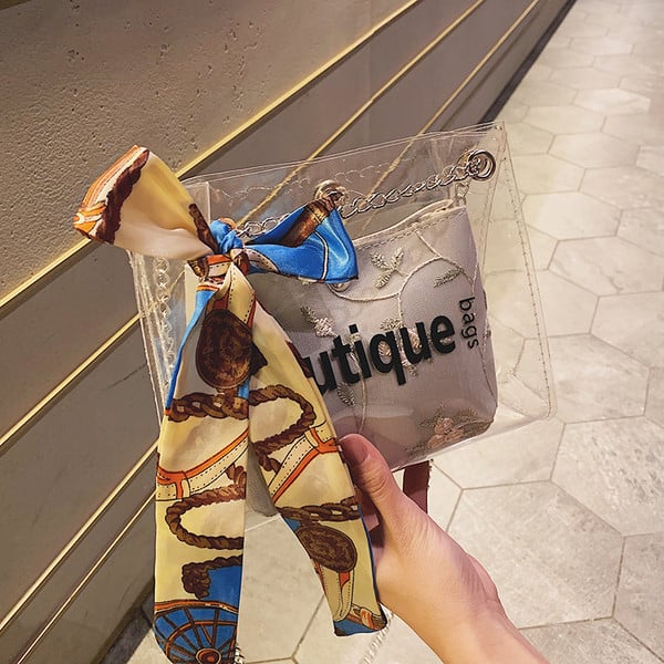 Geanta de dama moderna cu husa transparenta si broderie in patru culori